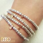 Dodo Mariani - Bracciale argento con simbolo in oro 9 Kt